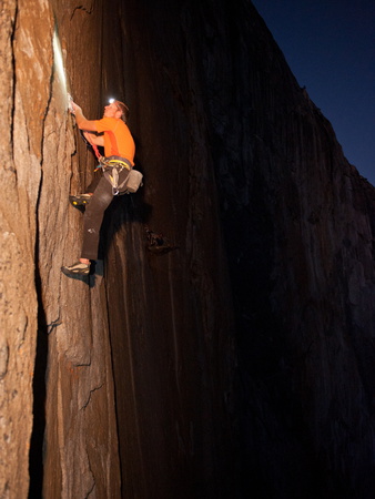 Buy Waiting Until Night for Cooler Temperatures, a Rock Climber Ascends El Capitan at AllPosters.com