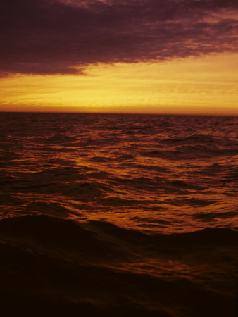 Buy A Dramatic Sky Casts a Red Glow over Waves on Lake Michigan at AllPosters.com