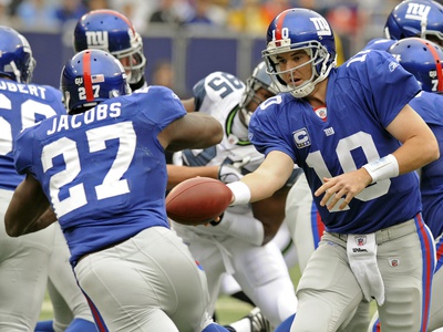 Seahawks Giants Football: East Rutherford, NEW JERSEY - Eli Manning and Brandon Jacobs Poster