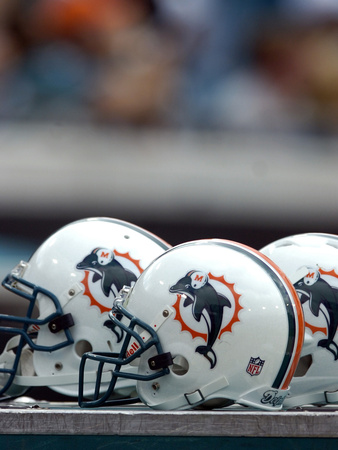 Buy Dolphins Jaguars Football: Jacksonville, FL - Miami Dolphins Helmets at AllPosters.com