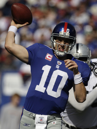Buy Raiders Giants Football: East Rutherford, NJ - Eli Manning at AllPosters.com
