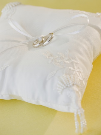 Wedding rings on pillow
