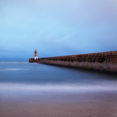 Lighthouse at dusk Poster
