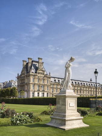 Statue of Nymphe and Louvre Museum, Paris