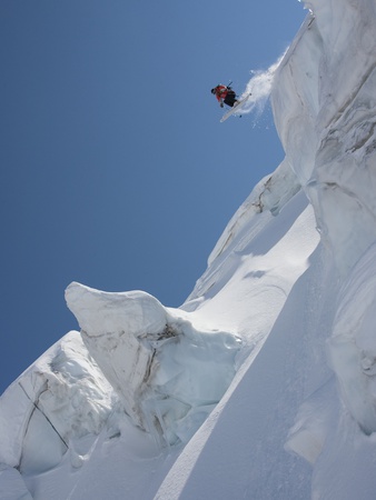 Back Country Skier Jumping Off Mountain