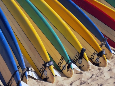 Row of Surfboards at Beach