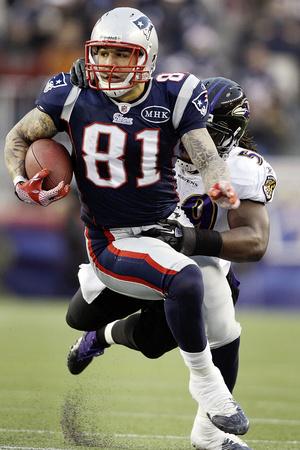 Baltimore Ravens and New England Patriots - Jan. 22, 2012: Aaron Hernandez and Dannell Ellerbe Poster