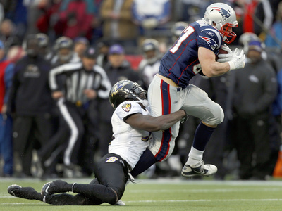 Buy Baltimore Ravens and New England Patriots - Jan. 22, 2012: Bernard Pollard and Rob Gronkowski at AllPosters.com