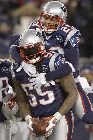 Buy Baltimore Ravens and New England Patriots - Jan. 22, 2012: Sterling Moore and Brandon Spikes at AllPosters.com