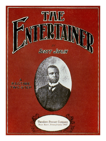 Cover of sheet music for <cite>The Entertainer: a Ragtime Two-Step</cite> by Scott Joplin, with an oval black-and-white photograph of the African-American composer, published by the Theodore Presser Company, Bryn Mawr, Pennsylvania