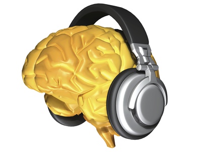 Yellow drawing of brain with silver and black headphones where the ears would be
