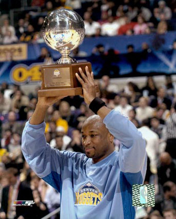 Voshon Lenard with 2004 All-Star Game 3 Point Contest Trophy &copy;Photofile