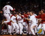 Pokey Reese jumping on plate scoring Game 3 - 2004 ALDS winning run against Angels &copy;Photofile
