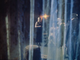 A View a Theatrical Performance from Behind a Stage Curtain