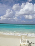 Buy Lone Lounge Chair on Sandy Beach at AllPosters.com