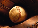 Old Baseball in Glove