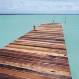 Wooden jetty leading out to sea