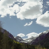 Clouds Above Mountain Range Photographic Print
