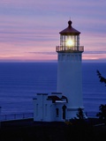 Lit-Up Lighthouse at Twilight