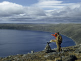 Buy Scientists Overlook Wind-Ruffled Water of a Crater Lake at AllPosters.com