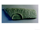 Fragment of a Palette with a Hunting Scene, from Abydos, circa 3300-3100 BC