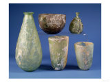 Clockwise from Left: Pear-Shaped Green Glass Flask, Sasanian, 3rd-7th Century AD