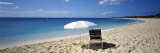 Single Beach Chair and Umbrella on Sand, Saint Martin, French West Indies
