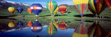 Reflection of Hot Air Balloons on Water, Colorado, USA