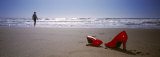 Woman and High Heels on Beach, California, USA