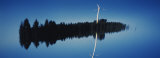 Reflection of a Wind Turbine and Trees on Water, Black Forest, Germany