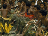 Buy Seated Schoolgirls Wear Grass Skirts Like Those Worn by Adult Women at AllPosters.com