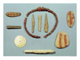 Three Stones with Red Markings from Mas-D'Arvil, a Bone Rod from La Madeleine