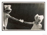 Two Little Girls Pull a Christmas Cracker