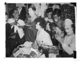 Bunch of Clowns from the Bertram Mills Circus Apply Their Make-Up in Their Dressing-Room