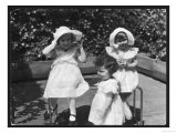 Three Little Girls in White Dresses with Matching Hats