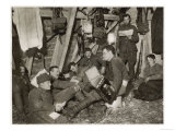 British Soldiers off Duty Smoking and Listening to an Accordion at the Front Somewhere in Flanders