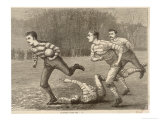 An Attacking Player Charges Forward with the Ball Chased by Two Opposing Players