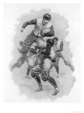 Buy Young Player Leaps Through a Tackle Whilst Clutching the Ball at AllPosters.com