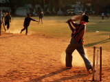 Buy Cricket Batsman Swings on Dusty Pitch, Fort Cochin, India at AllPosters.com
