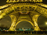 Buy Line of Tourists Queuing Under Eiffel Tower at Night, Paris, France at AllPosters.com