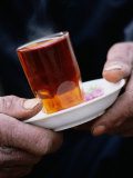 Man Holding a Glass of Tea, Esfahan, Iran
