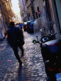 Buy Man Walking Down Street of Trastevere Rome, Italy at AllPosters.com