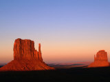 Sunlight Strikes the East and West Mitten Buttes, Monument Valley Navajo Tribal Park, Arizona