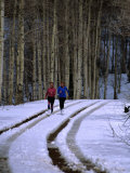 Women Jogging in a Wintery Park City, Park City, Utah, USA