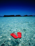 Red Thongs Floating on Sea off Ko Kham, Thailand