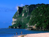 People in Water at Tumon Beach with Amantes (Two Lovers) Point Behind, Tumon, Guam