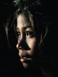 Afternoon Sunlight Profiles a Young Female Villager from the Lake Batur Region, Batur, Indonesia