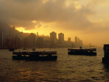Ferries Silhouetted on the Harbour at Sunset, Hong Kong