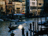 Traditional Gondola Amongst Traffic on Grand Canal, Venice, Italy