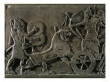 King Ashurnazirpal Hunting Lions, a Lion Leaping at the King's Chariot